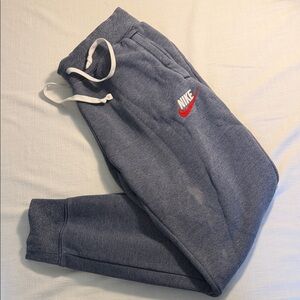 Nike Men's Heather Blue Sweatpants with White Drawstring and Red Swoosh